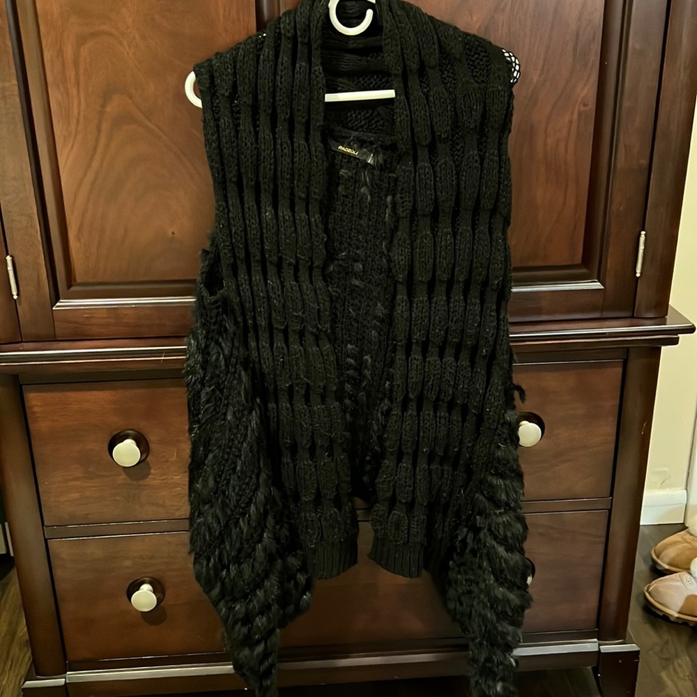 Black Fur vest made with 50% polyester 50% rabbit fur